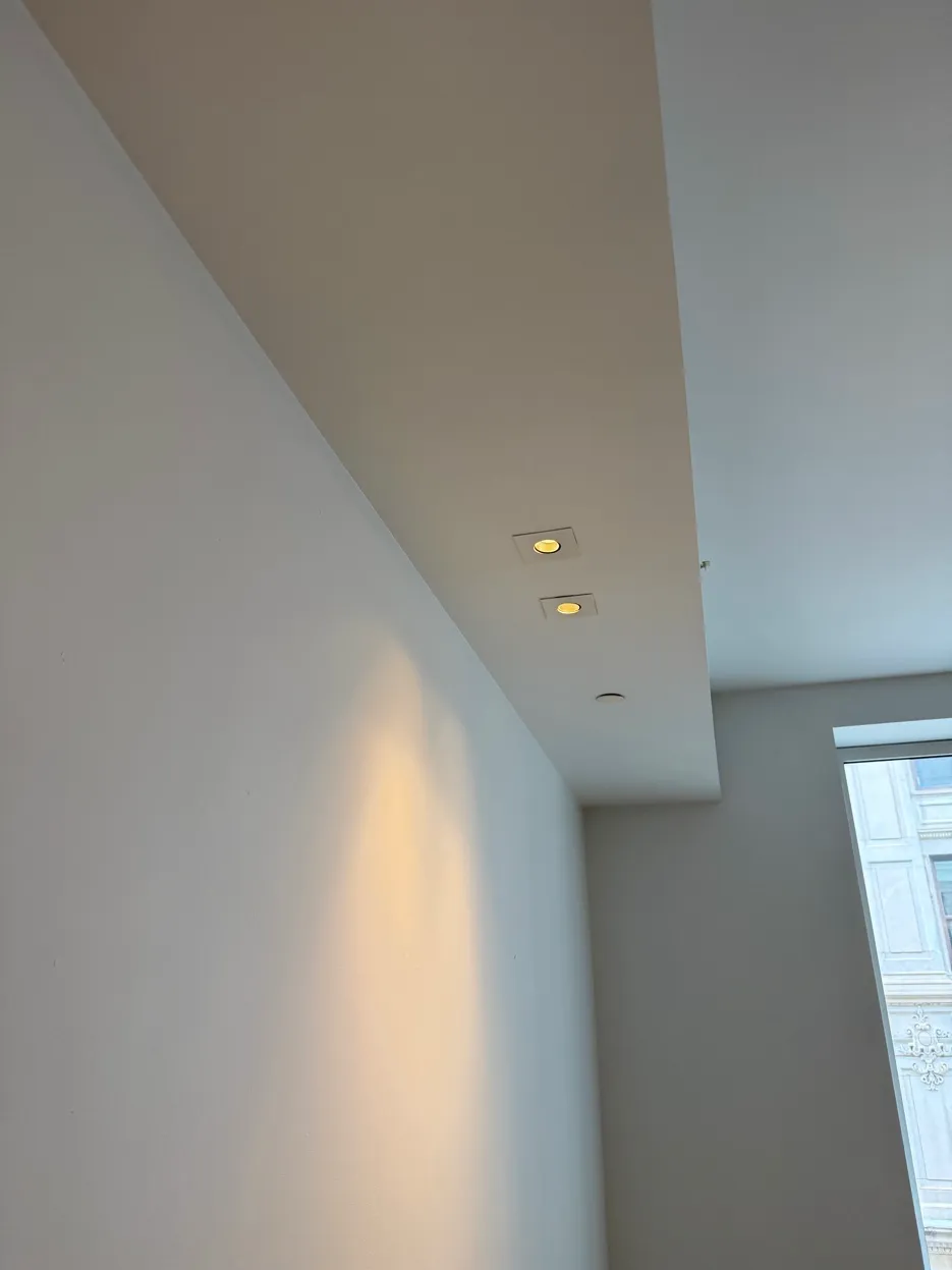 Tray ceiling in the office - recessed lower section creates a cavity for cable routing